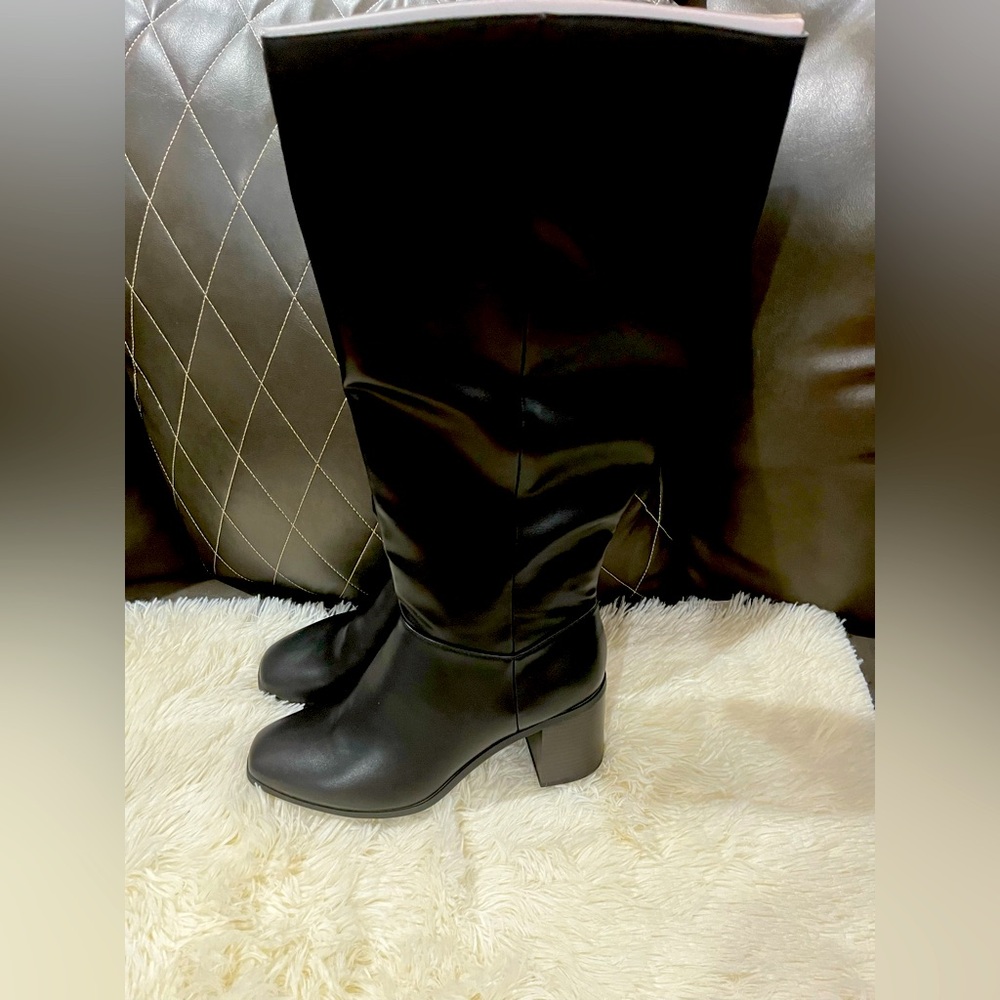 Brand New 
Black Tall Boots with memory foam.
